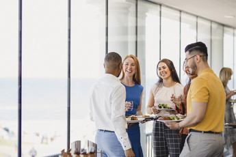ground travel options Group Of People Talking With Lunch